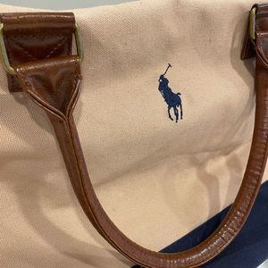 Polo - Ralph Lauren overnight bag. Canvas body with beautiful leather accents.